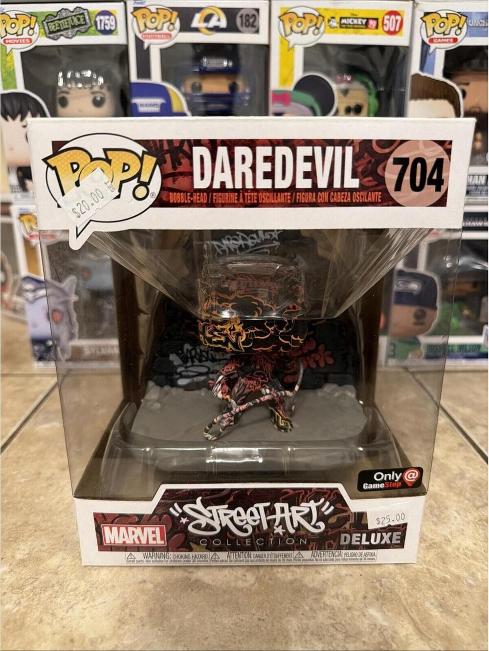 Funko Pop! Deluxe: Marvel - Daredevil - GameStop (Exclusive) #704 w/Protector